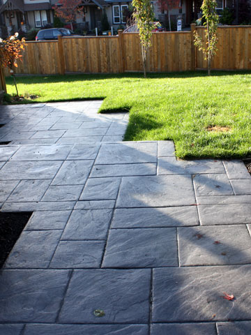 Concrete finishes including brushed, exposed, or stamped for patios and walkways